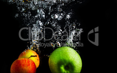 Apples in water