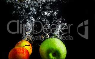 Apples in water