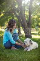Woman with dog in park