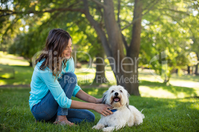 Woman with dog in park