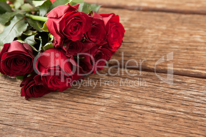 Bunch of red roses and gift box