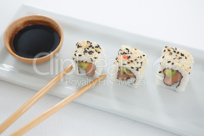 Sushi on tray with sauce