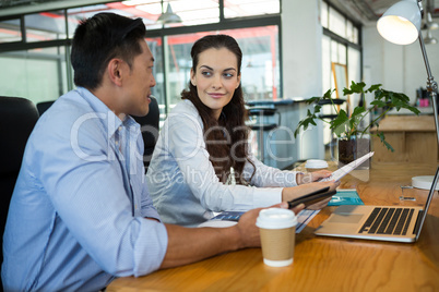 Business executives interacting with each other