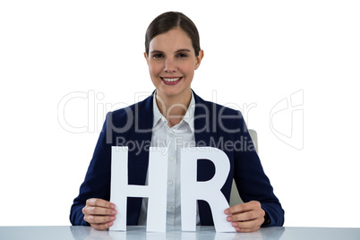 Conceptual image of businesswoman holding hr sign