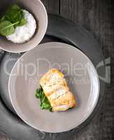 Fried cod fillets and spinach