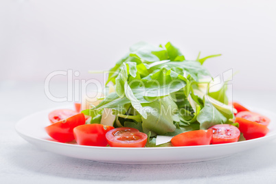 Salad with arugula, tomatoes