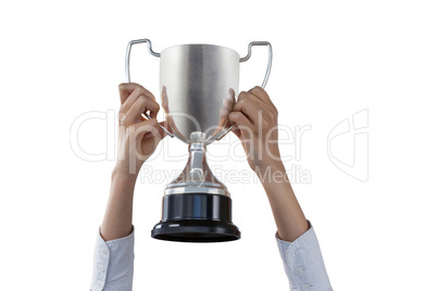 Females hands holding trophy