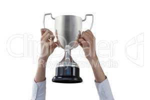 Females hands holding trophy