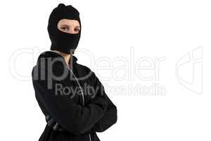 Portrait of female hacker standing with arms crossed
