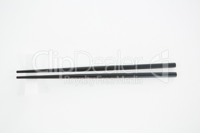 Chopsticks on a white background