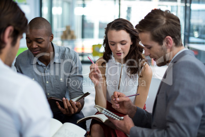 Business executives discussing during meeting