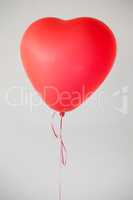 Heart-shaped red balloon