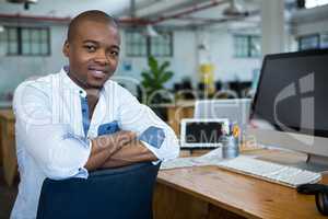 Graphic designer sitting at desk