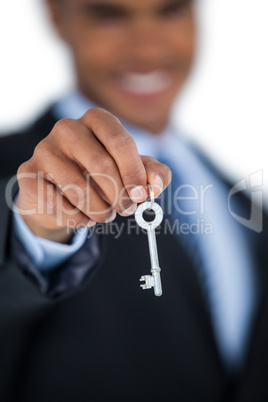 Businessman showing new house key