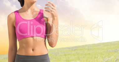 Composite image of Fitness Torso against beautiful landscape