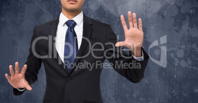 Composite image of Businessman Torso against dark background