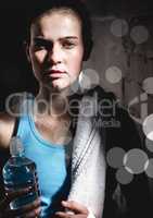 Composite image of Women with bottle and towel with bokeh