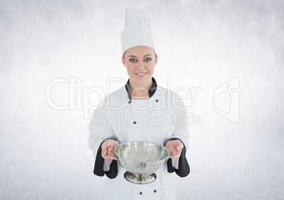 Composite image of Chef with sieve against white background