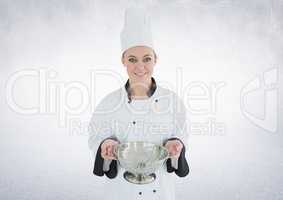 Composite image of Chef with sieve against white background