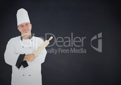 Composite image of Chef with rolling pin against navy background