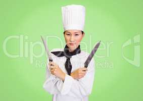 Chef with knives against green background