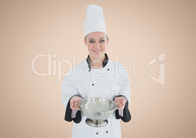 Chef with sieve against cream background