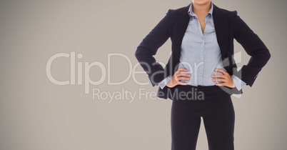 Composite image of Businesswoman Torso against grey background