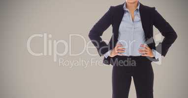 Composite image of Businesswoman Torso against grey background