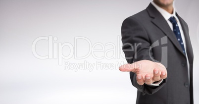 Businessman Torso who is stretching his hand against a neutral background