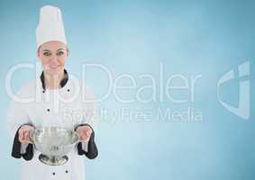Chef with sieve against blue background