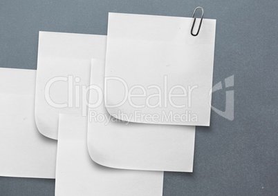 Composite image of white Sticky Note against grey background