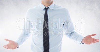 Businessman Torso showing his hands against neutral grey background