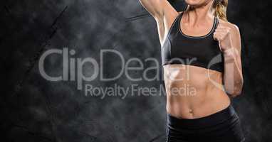 Fitness woman Torso making exercises against black background