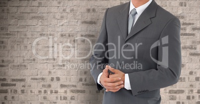 Businessman Torso against a stone wall