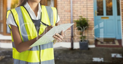 Composite image of Architect Torso against home