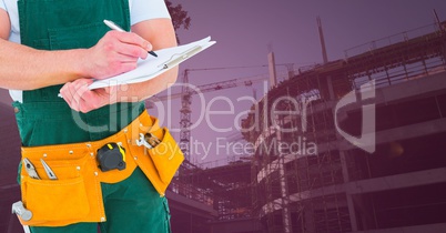 Carpenter with clipboard in building site with pink overlay