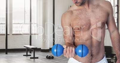 Fitness man Torso making fitness exercises in a gym