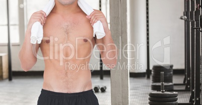 Composite image of man Fitness Torso against gym