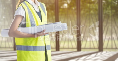 Architect Torso holding plan in the street