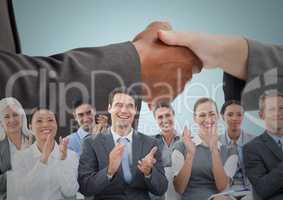 Handshake with business people and blue background