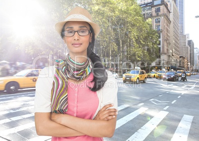 Composite image of Woman with hat and scarf on street with flare