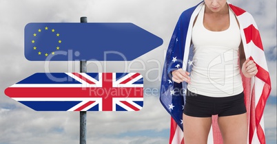 Fitness woman Torso holding american flag with arrow representing the European union in one side and