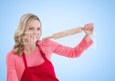 Woman with rolling pin against white background