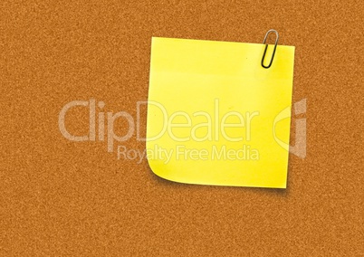 Yellow Sticky Note against a board