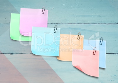 Sticky Notes against a colourfull wood background