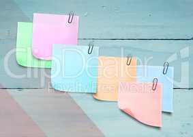 Sticky Notes against a colourfull wood background
