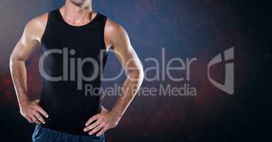 Composite image of Fitness man Torso against dark blackground