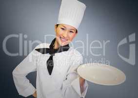 Chef with plate against grey background