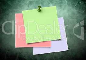 Composite image of colored Sticky Note against green background