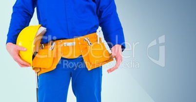 Composite image of carpenter against blue background